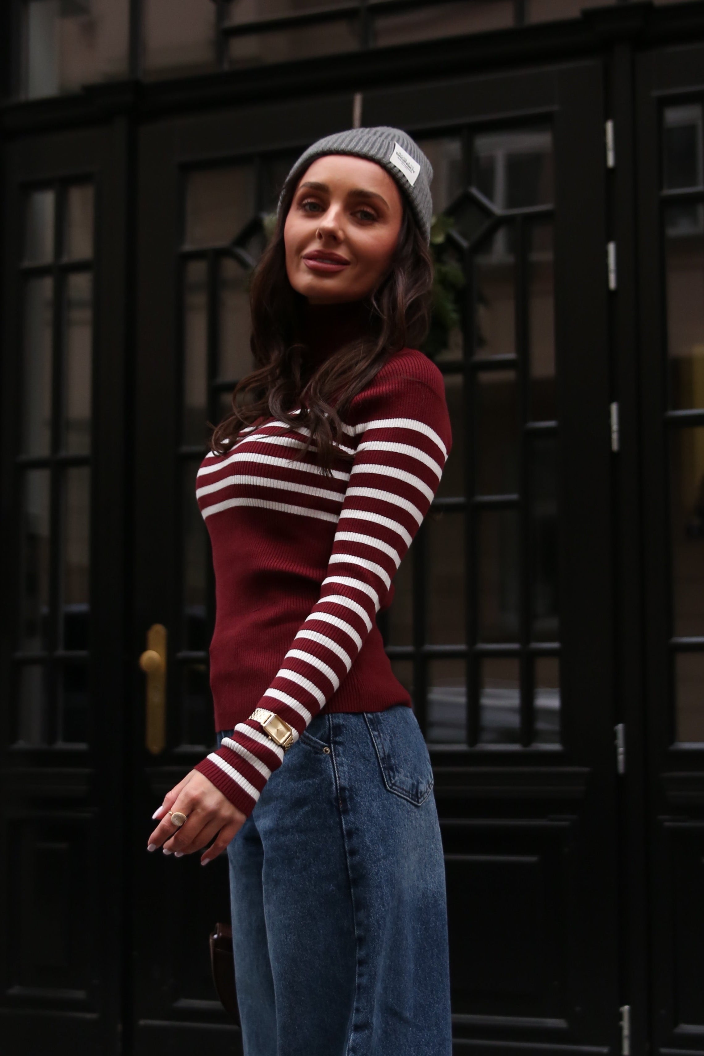 Red turtleneck sweater with a milky stripe