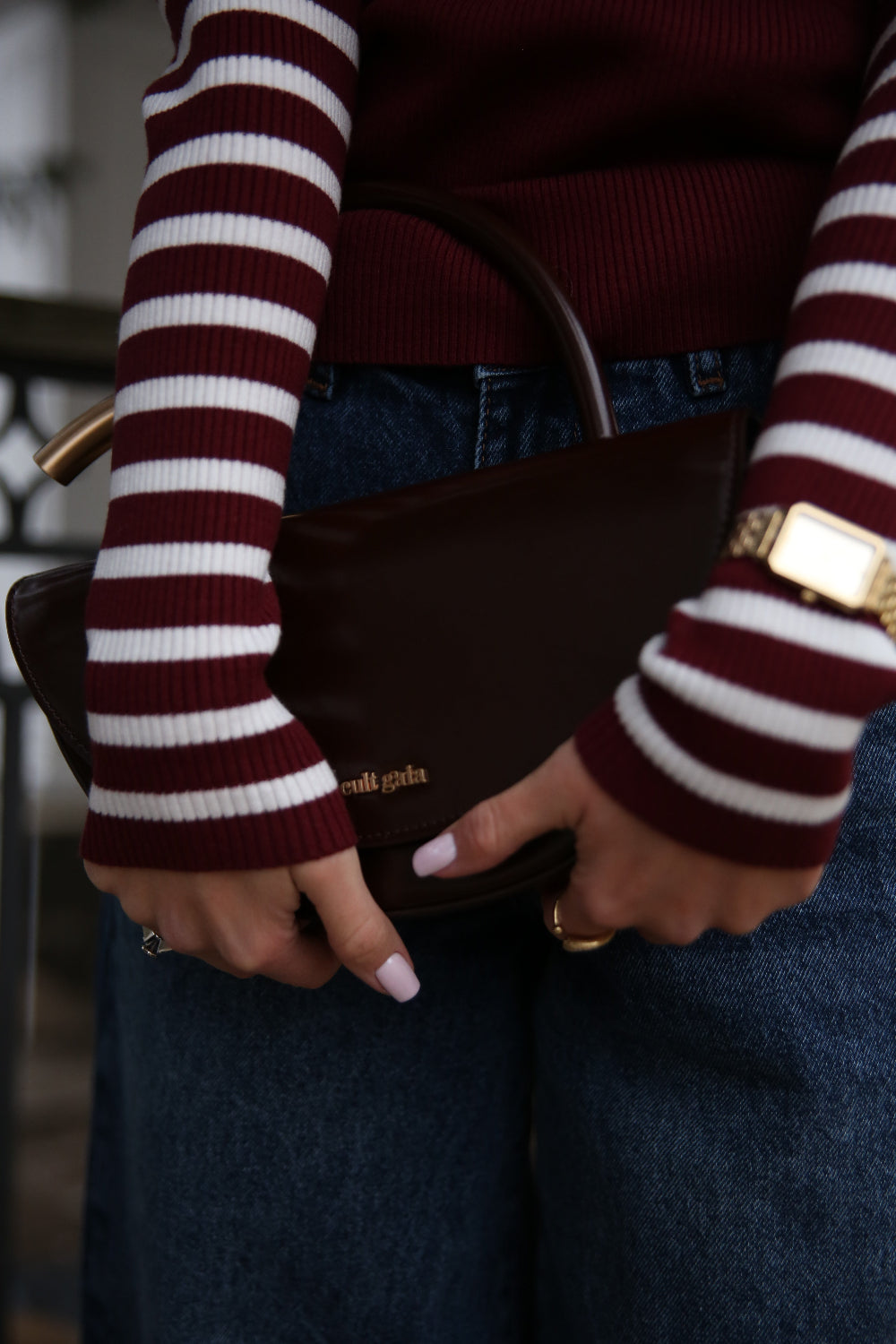 Red turtleneck sweater with a milky stripe